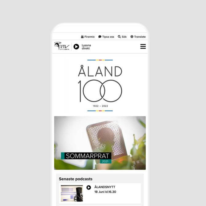 mobil som visar Ålands Radios webbsida